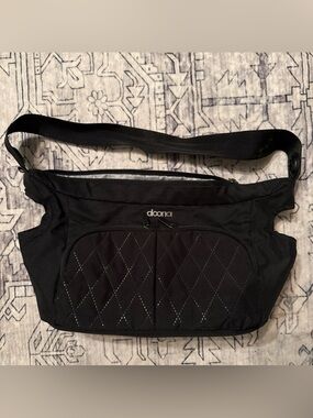 Doona Essentials Diaper Bag Nitro + changing pad and seat cover